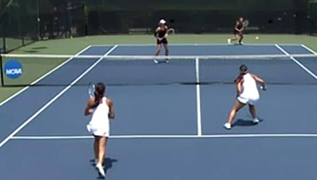 4 women playing a female's Doubles tennis match