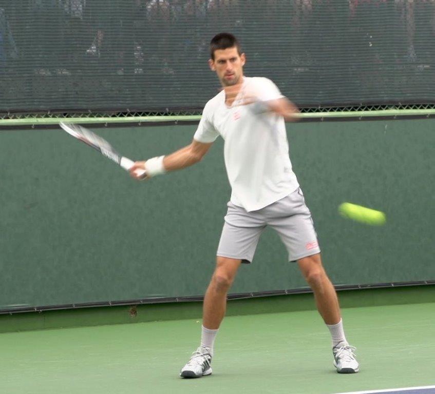 Novak Djokovic in the open stance.